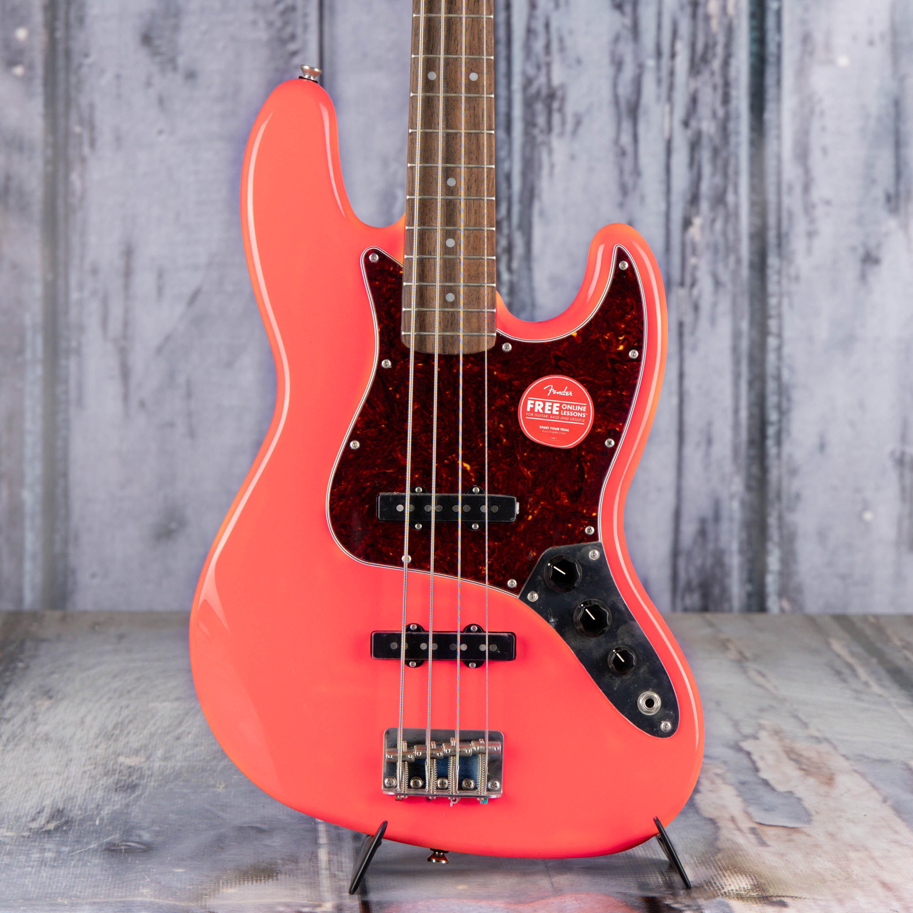 Squier Classic Vibe '60s Jazz Bass Guitar, Tahitian Coral, front closeup