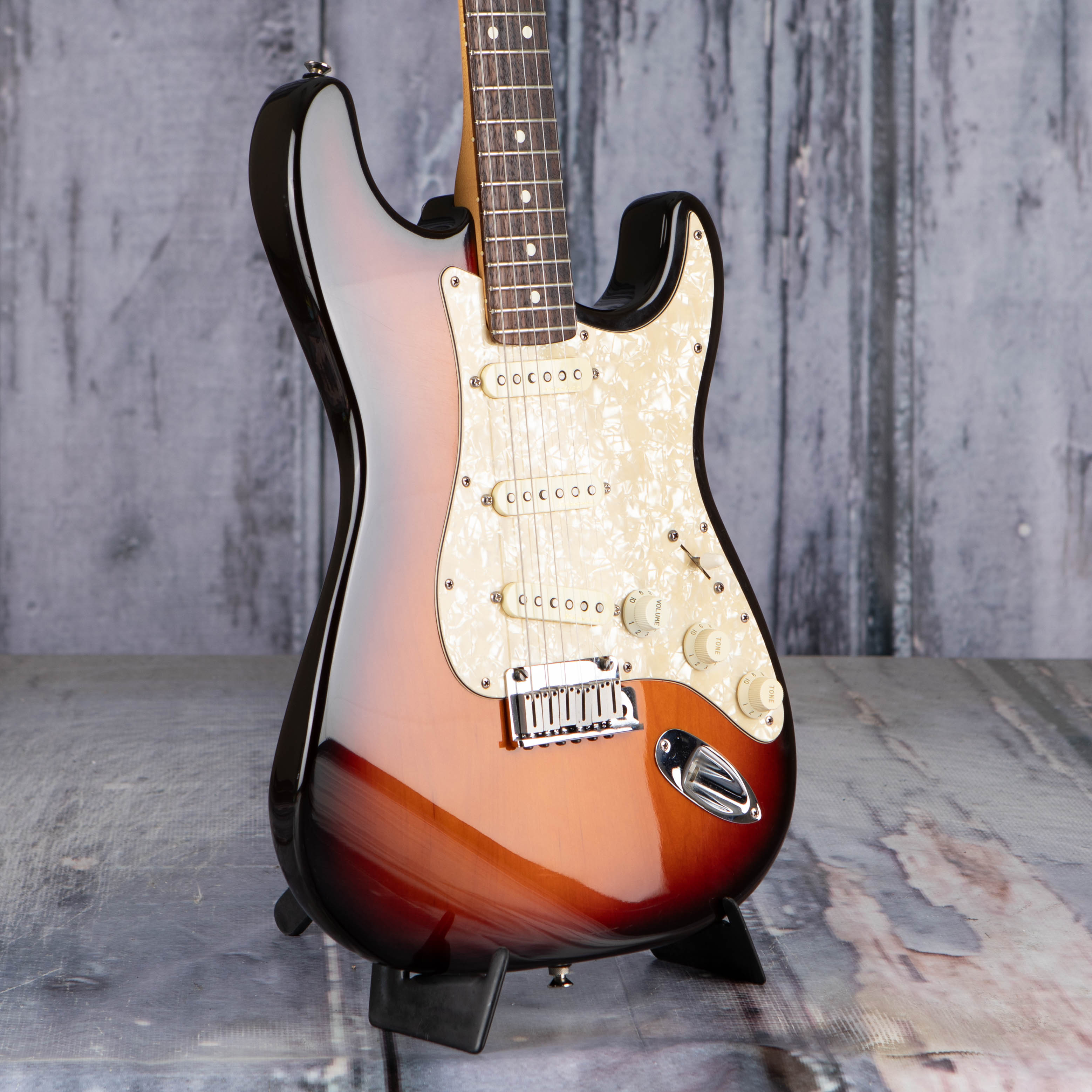 Used Fender American Standard Stratocaster Electric Guitar, 1996, 3-Color Sunburst, angle