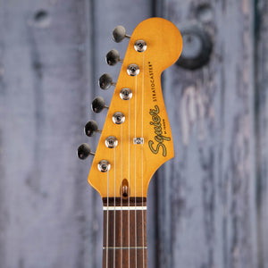 Squier Classic Vibe '60s Stratocaster Electric Guitar, Candy Apple Red, front headstock