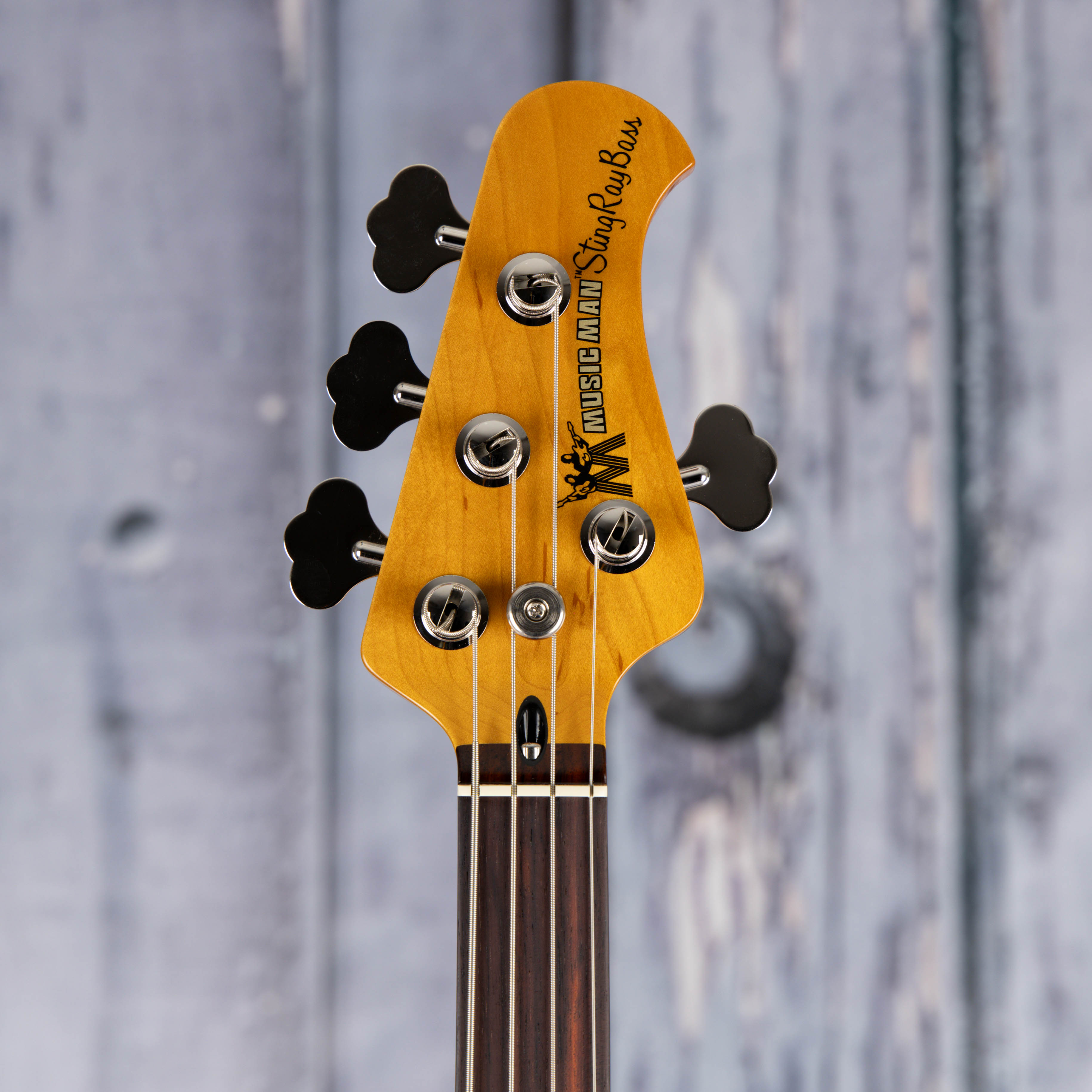 Ernie Ball Music Man Pino Palladino Fretless StingRay Electric Bass Guitar, 79 Burst, front headstock