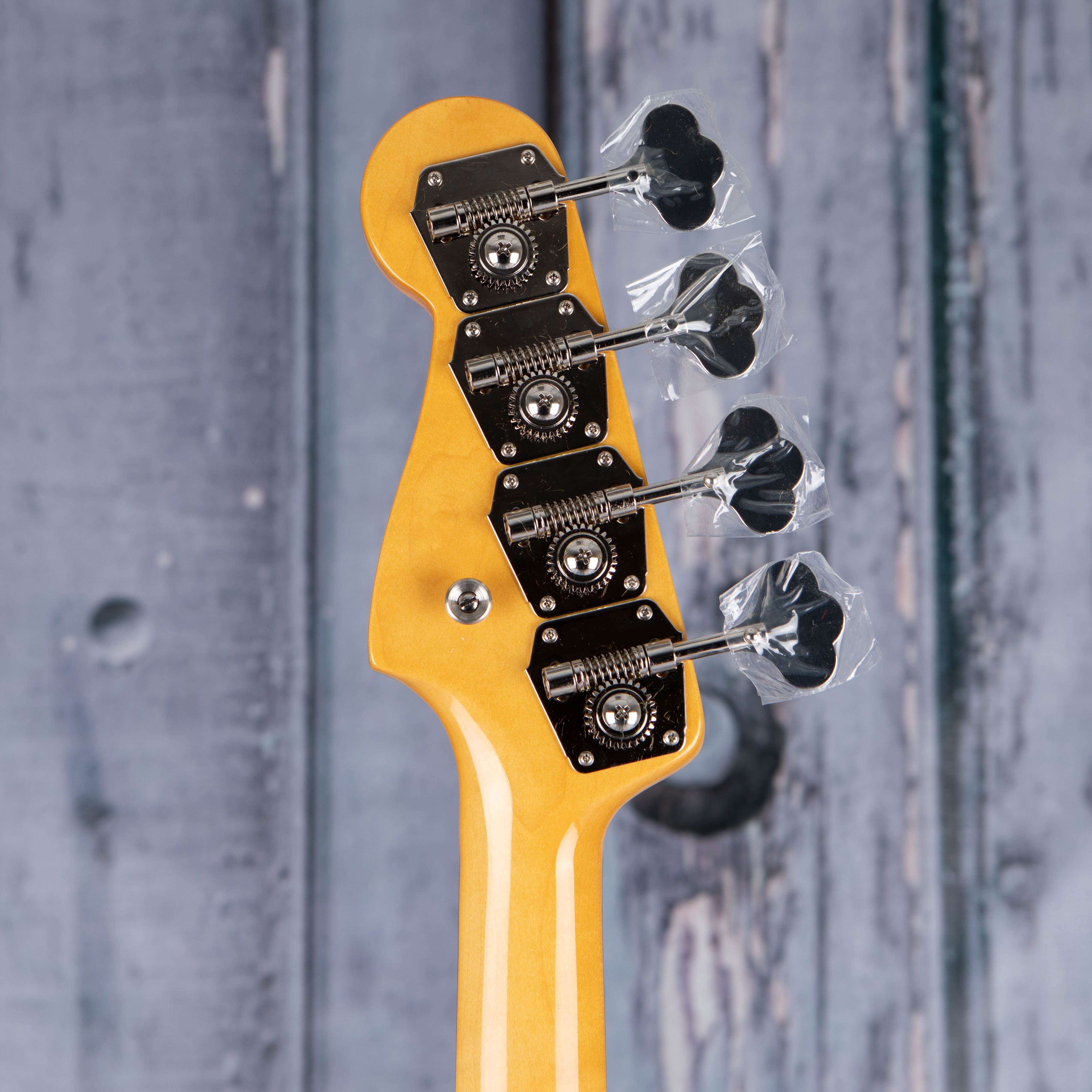 Fender American Vintage II 1960 Precision Bass Guitar, 3-Color Sunburst, back headstock