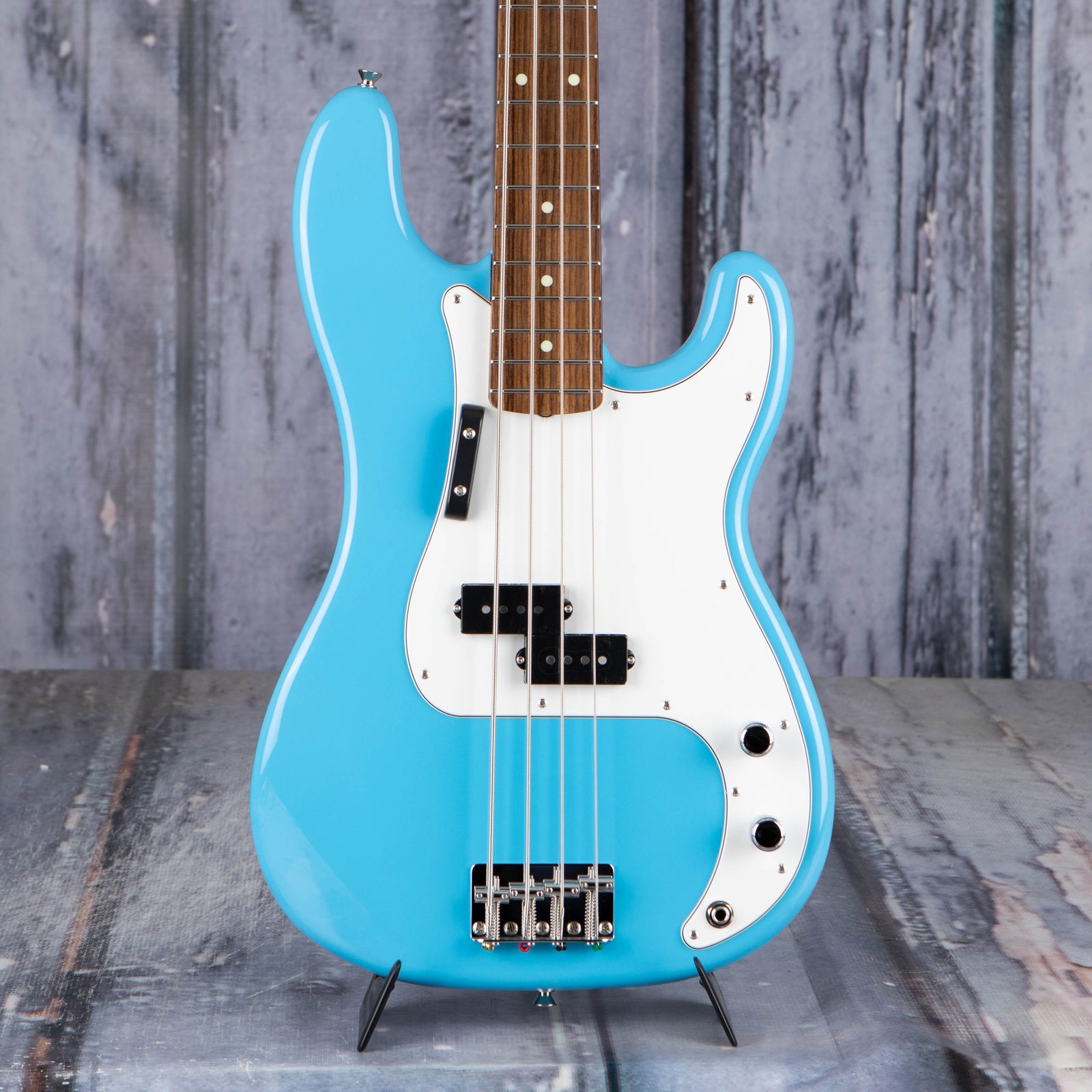 blue fender bass guitar