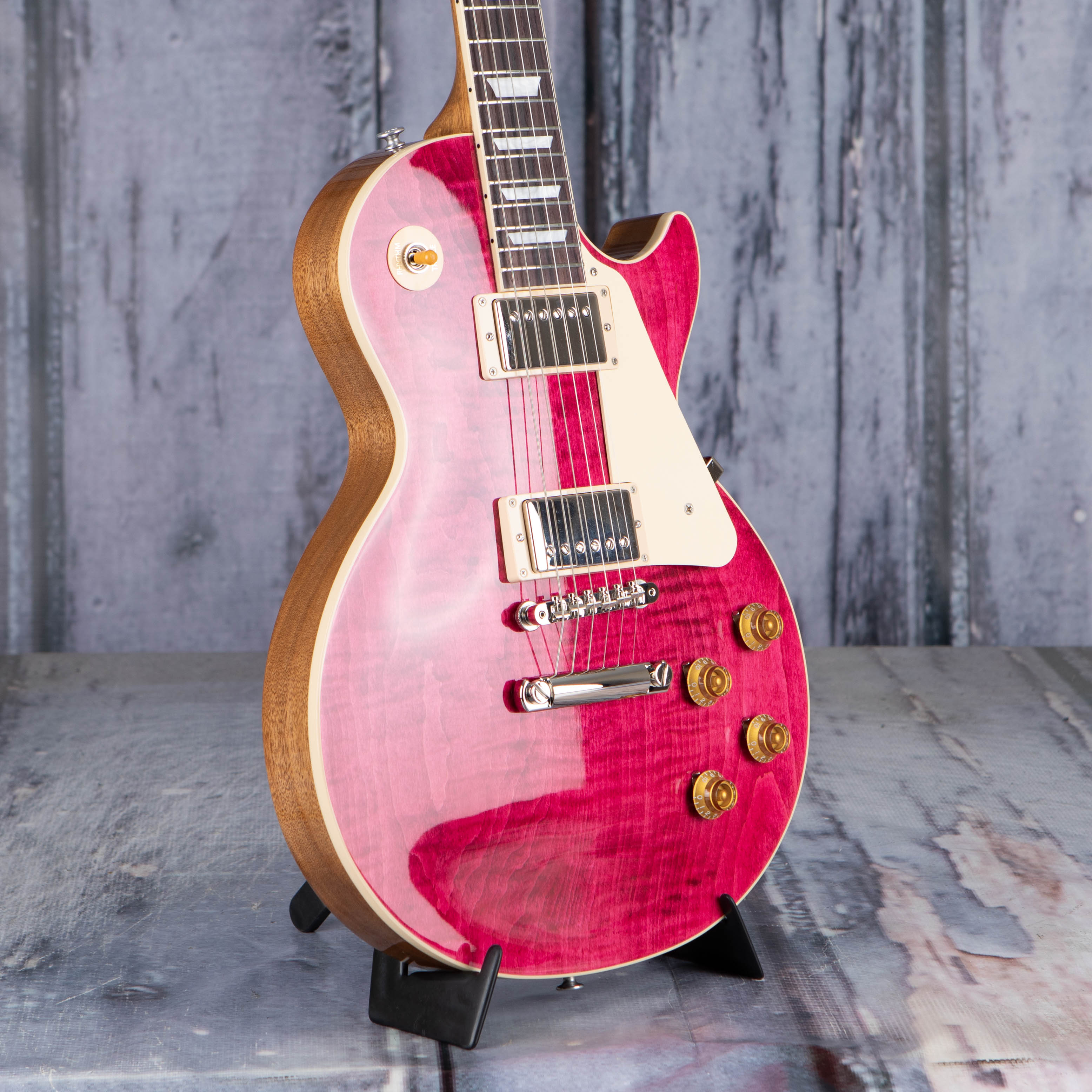 Gibson USA Les Paul Standard 50s Figured Top Electric Guitar, Translucent Fuchsia, angle