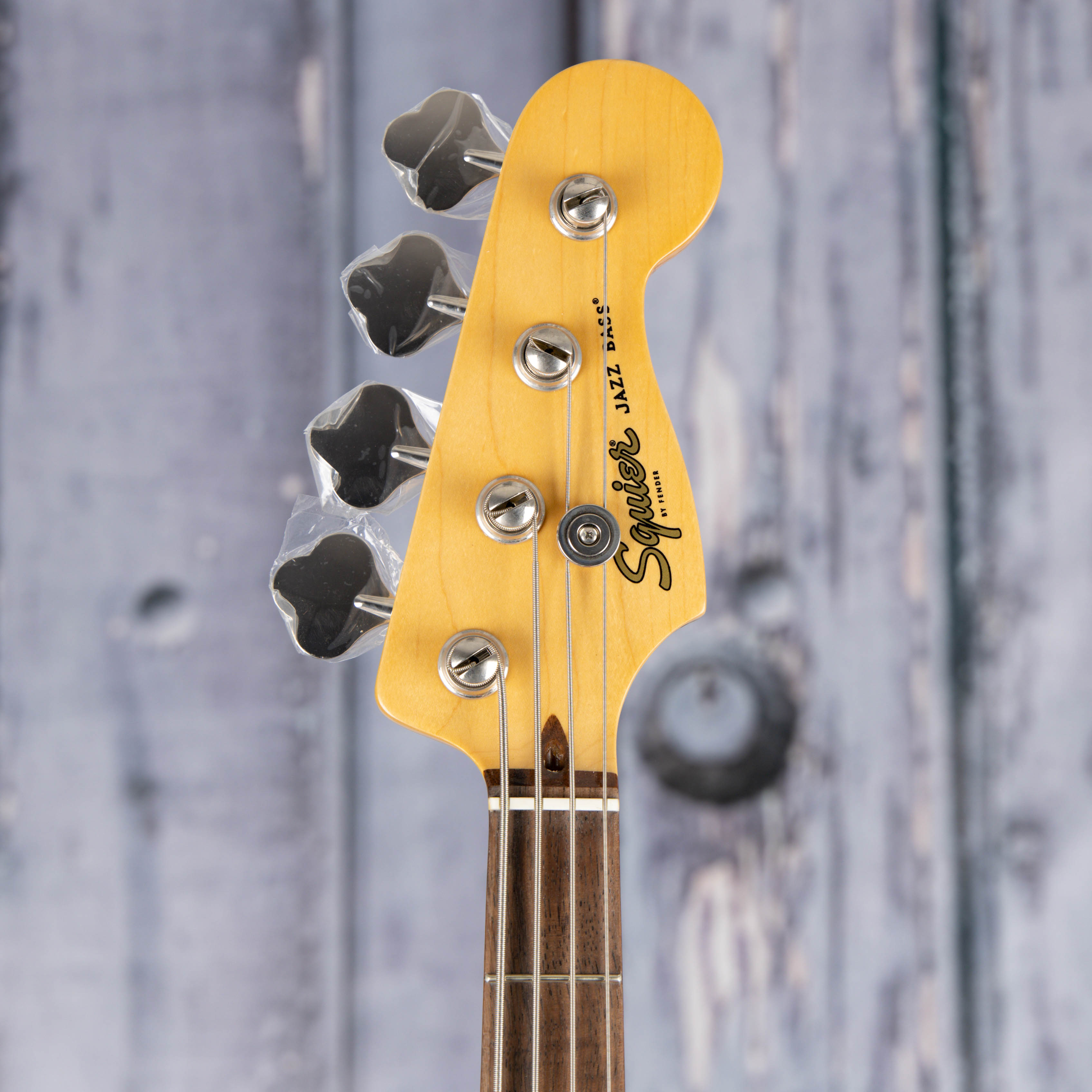 Squier Classic Vibe '60s Jazz Bass Guitar, Tahitian Coral, front headstock