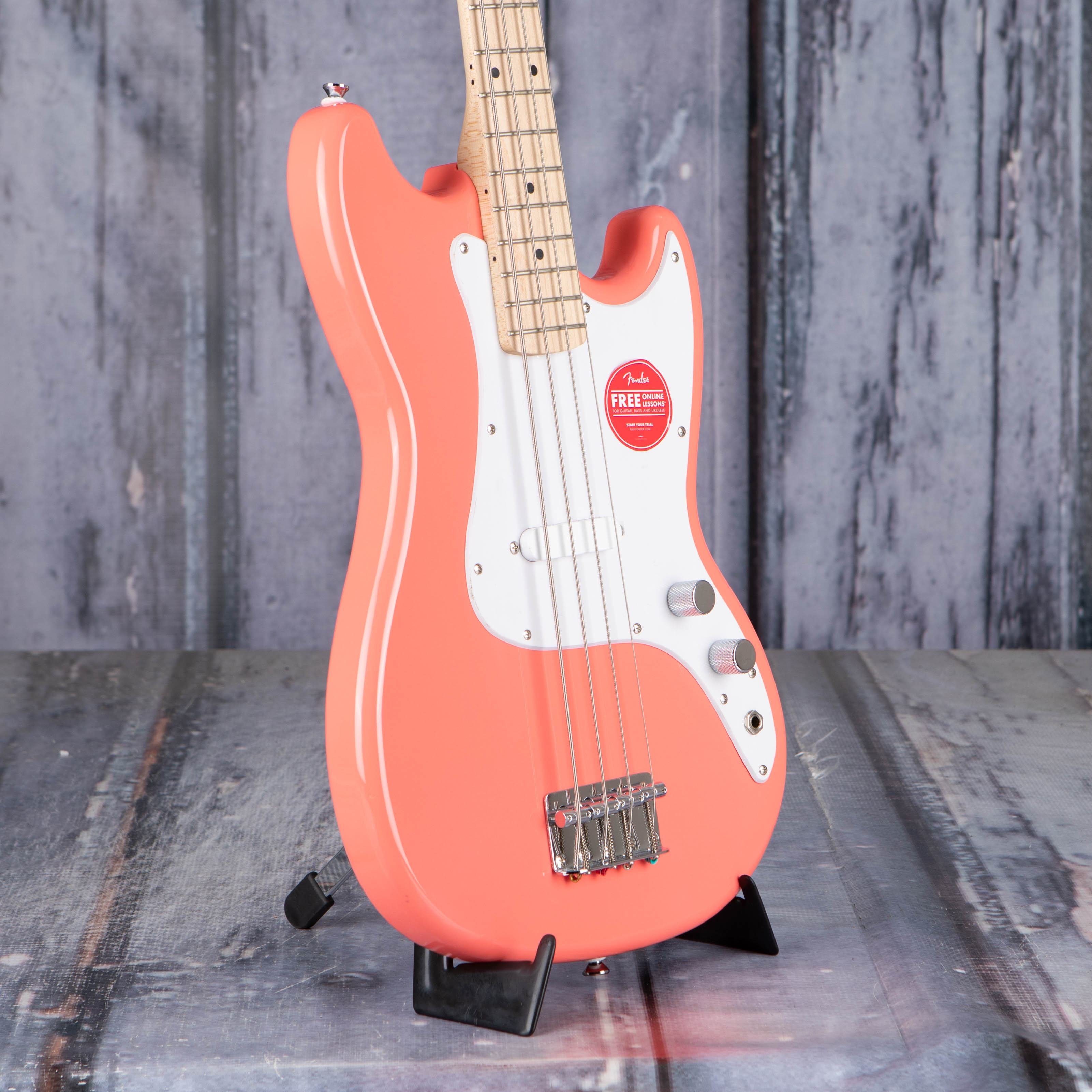 Squier Sonic Bronco Electric Bass Guitar, Tahitian Coral, angle
