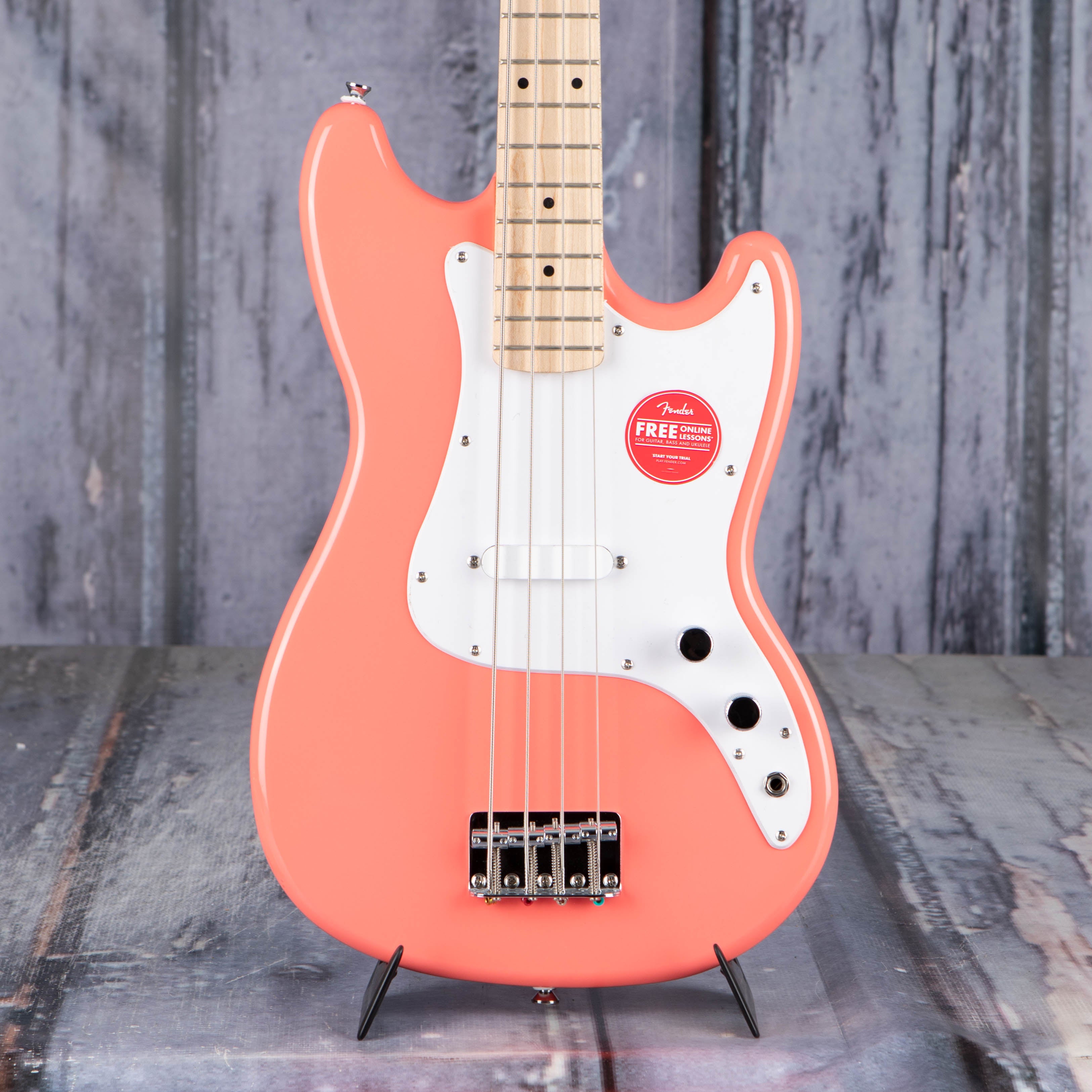 Squier Sonic Bronco Electric Bass Guitar, Tahitian Coral, front closeup