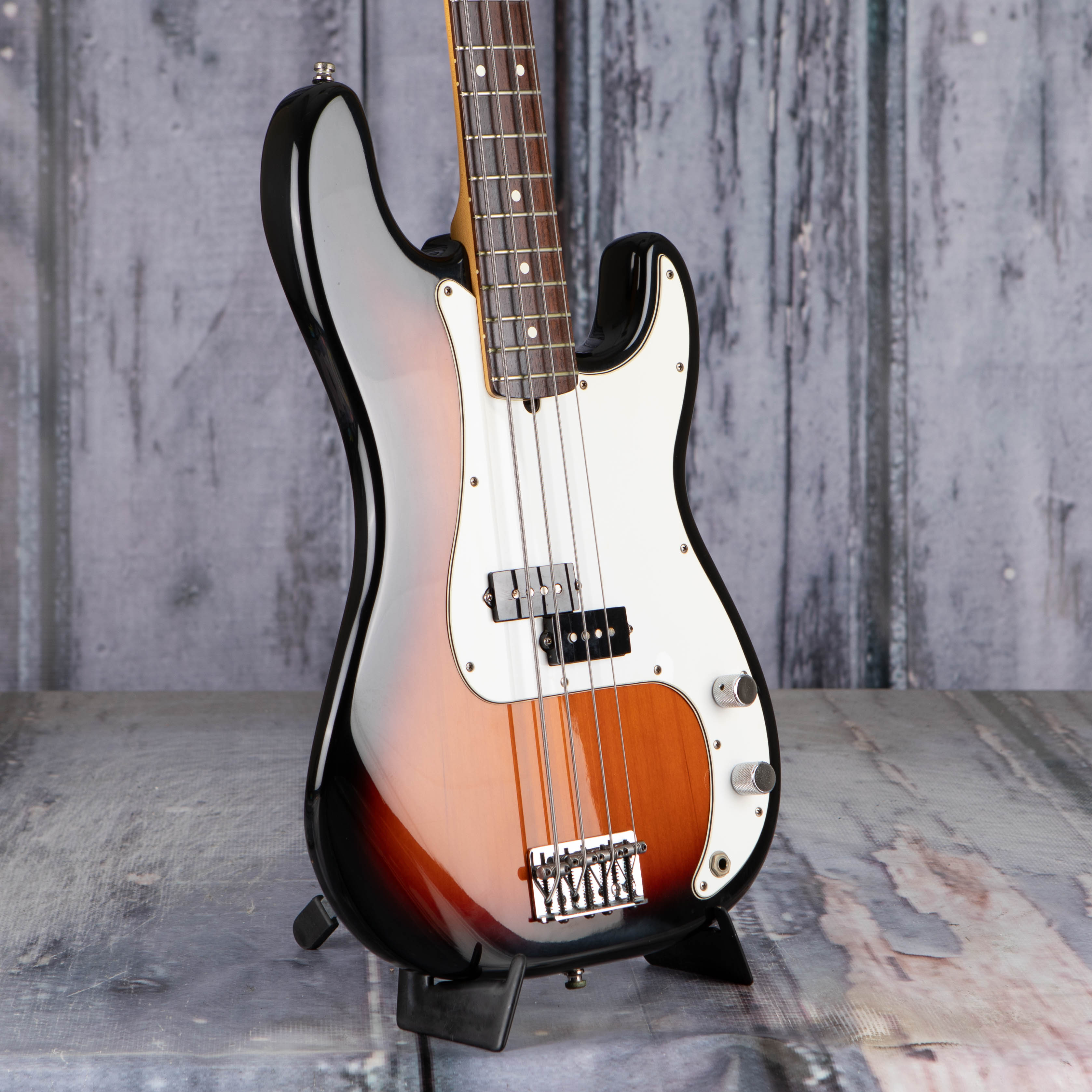 Used Fender American Standard Precision Bass Guitar, 1995, Brown Sunburst, angle