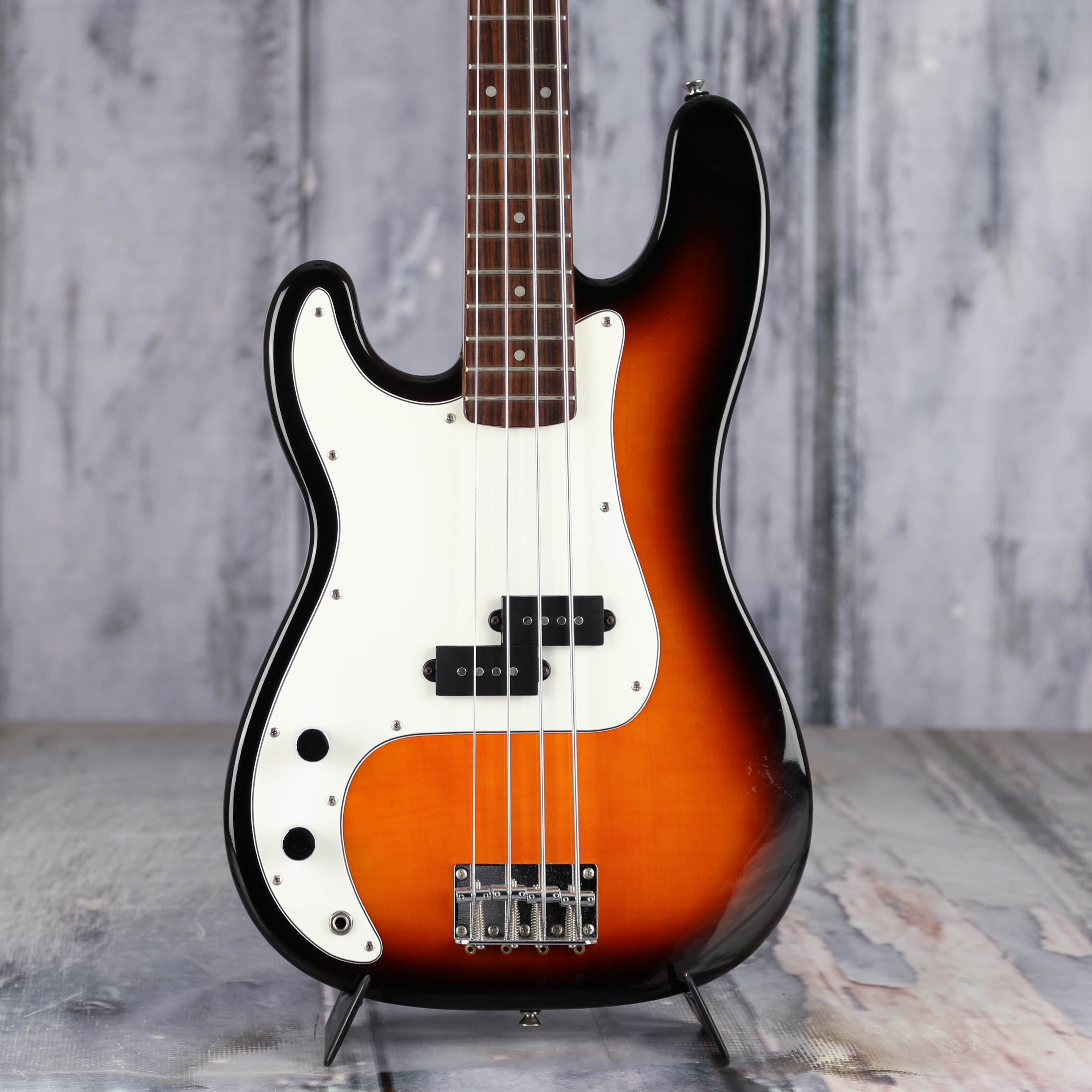 Used Squier Left-Handed Precision Bass Guitar, Brown Sunburst, front closeup