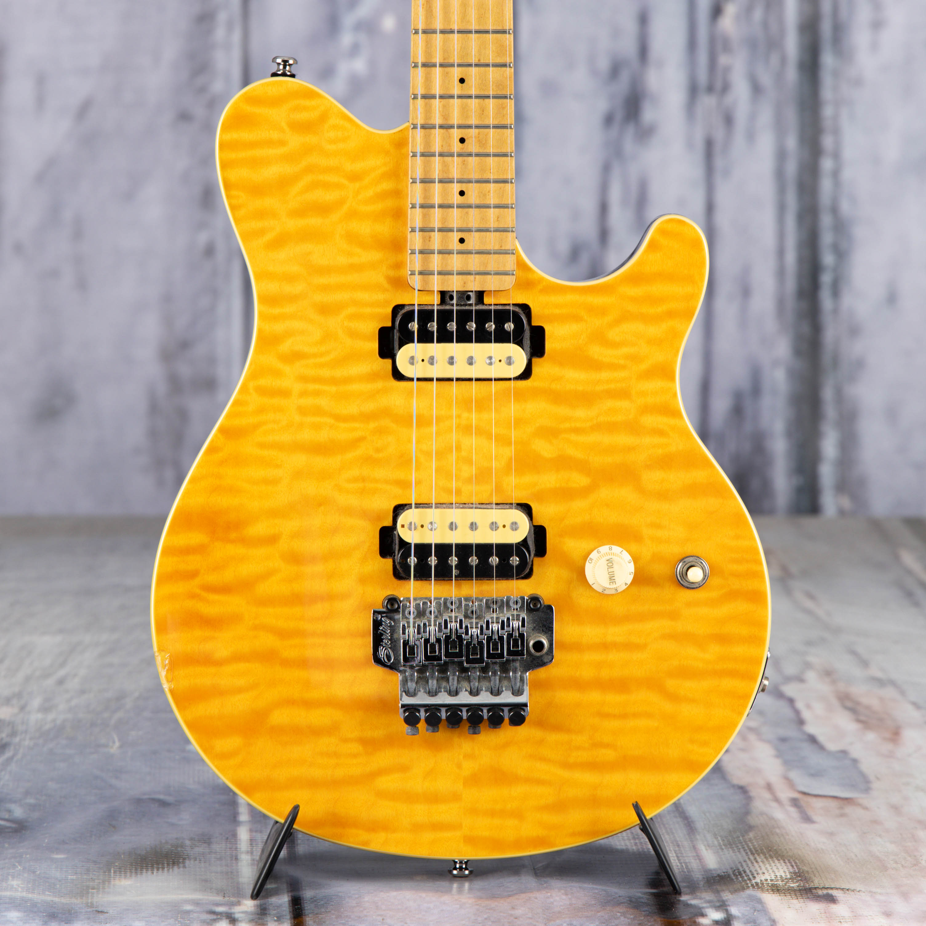 Used Sterling By Music Man AX40 Electric Guitar, 2015, Transparent Amber, front closeup