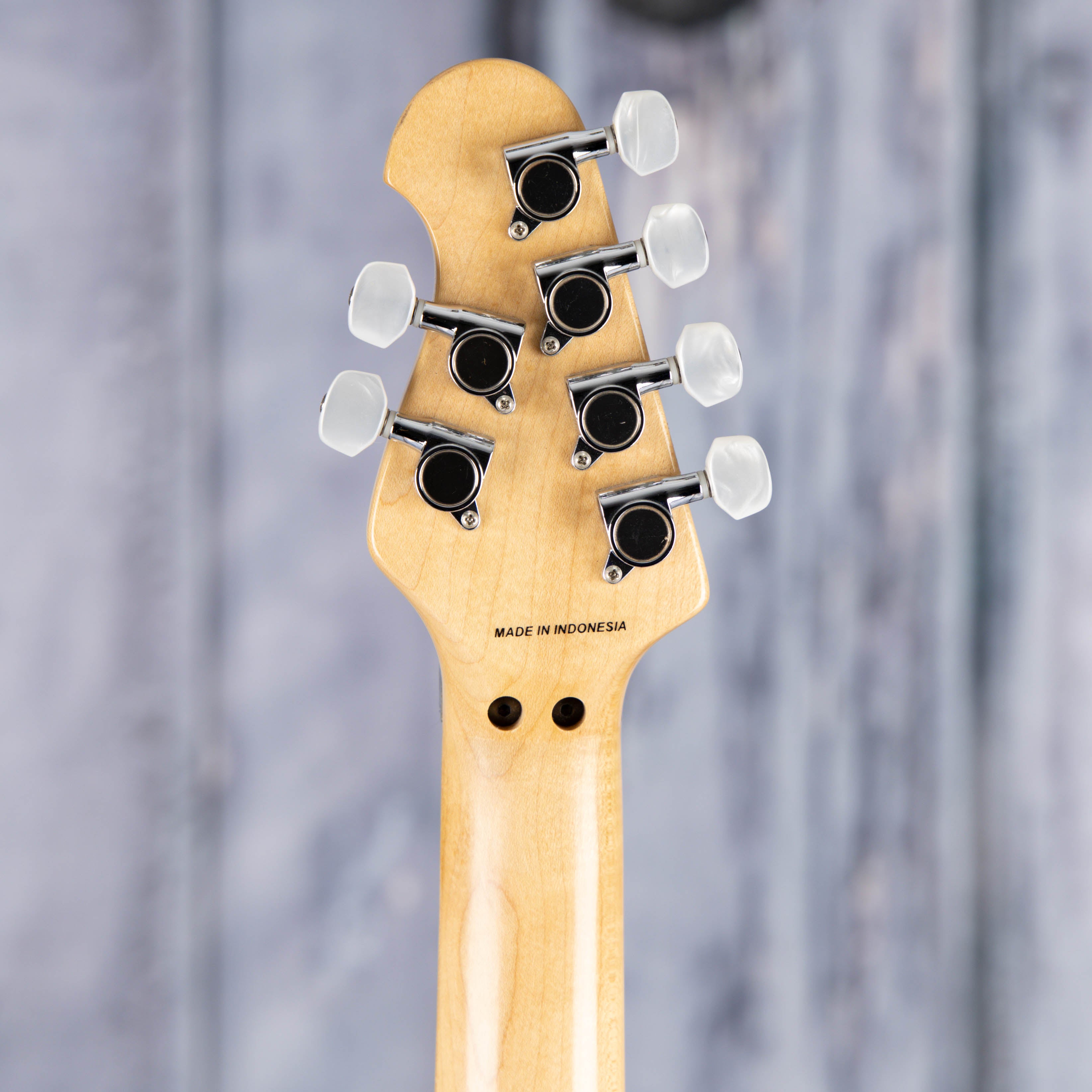 Used Sterling By Music Man AX40 Electric Guitar, 2015, Transparent Amber, back headstock