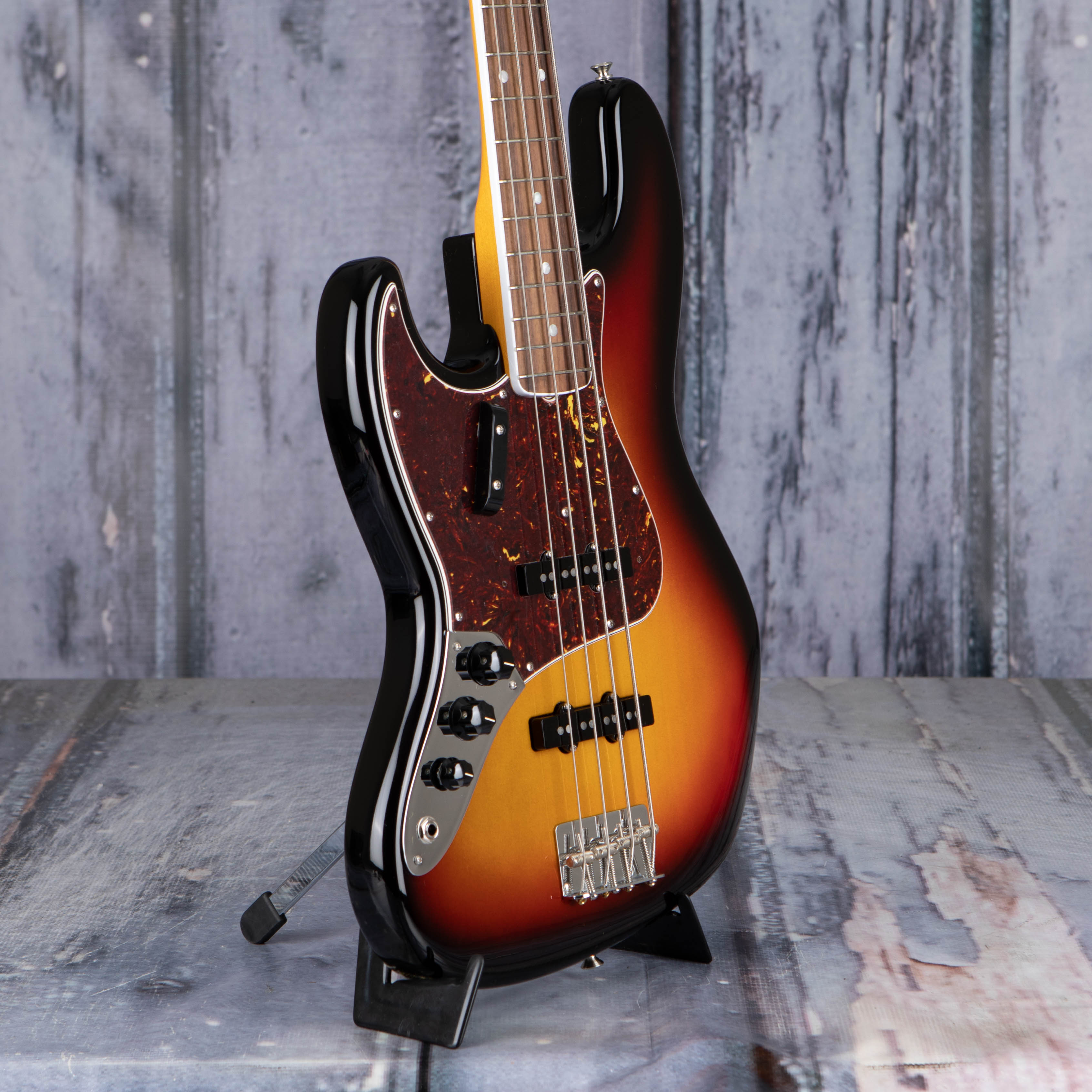 Fender American Vintage II 1966 Jazz Bass Left-Handed Electric Guitar, 3-Color Sunburst, angle
