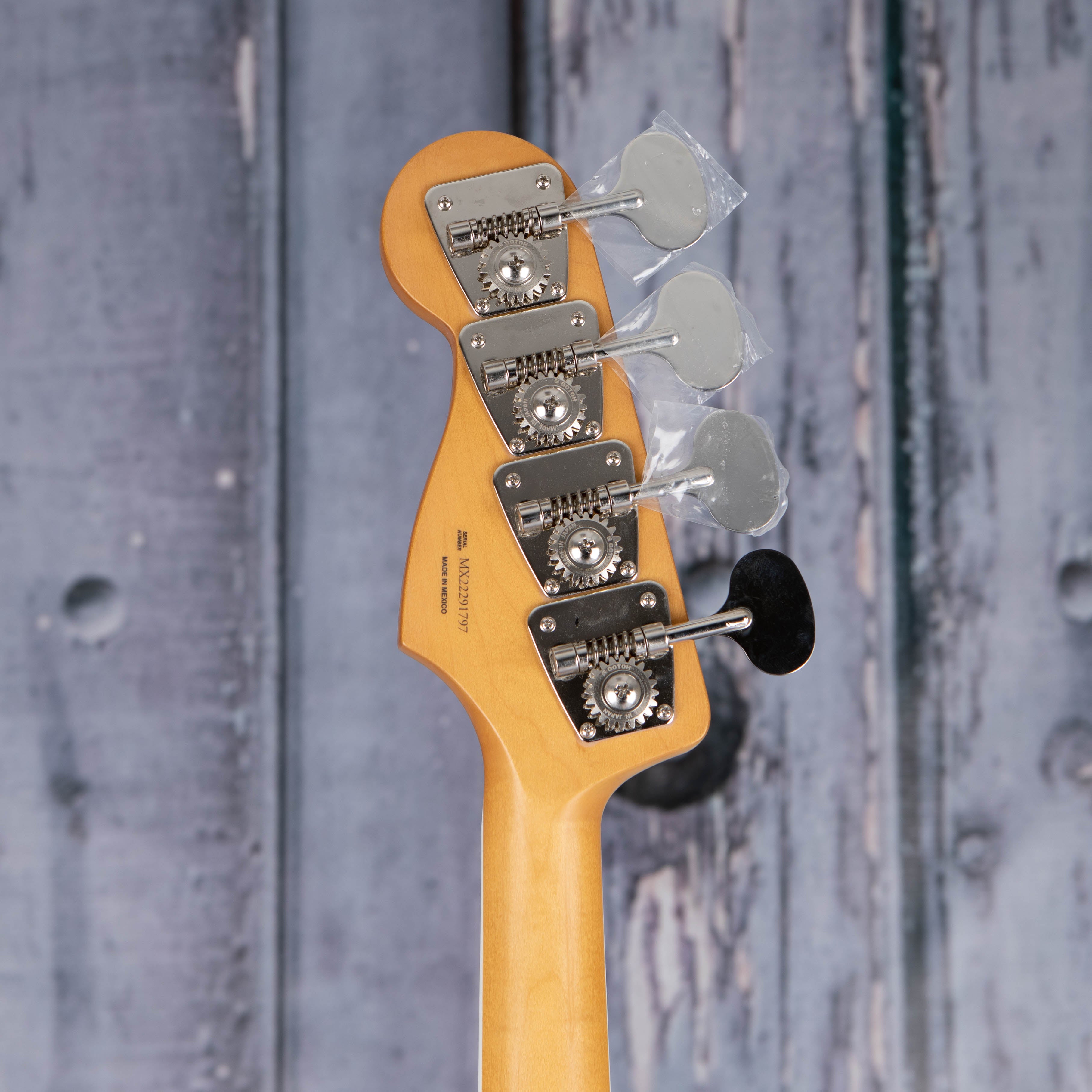 Fender Gold Foil Jazz Bass Guitar, 2-Color Sunburst, back headstock