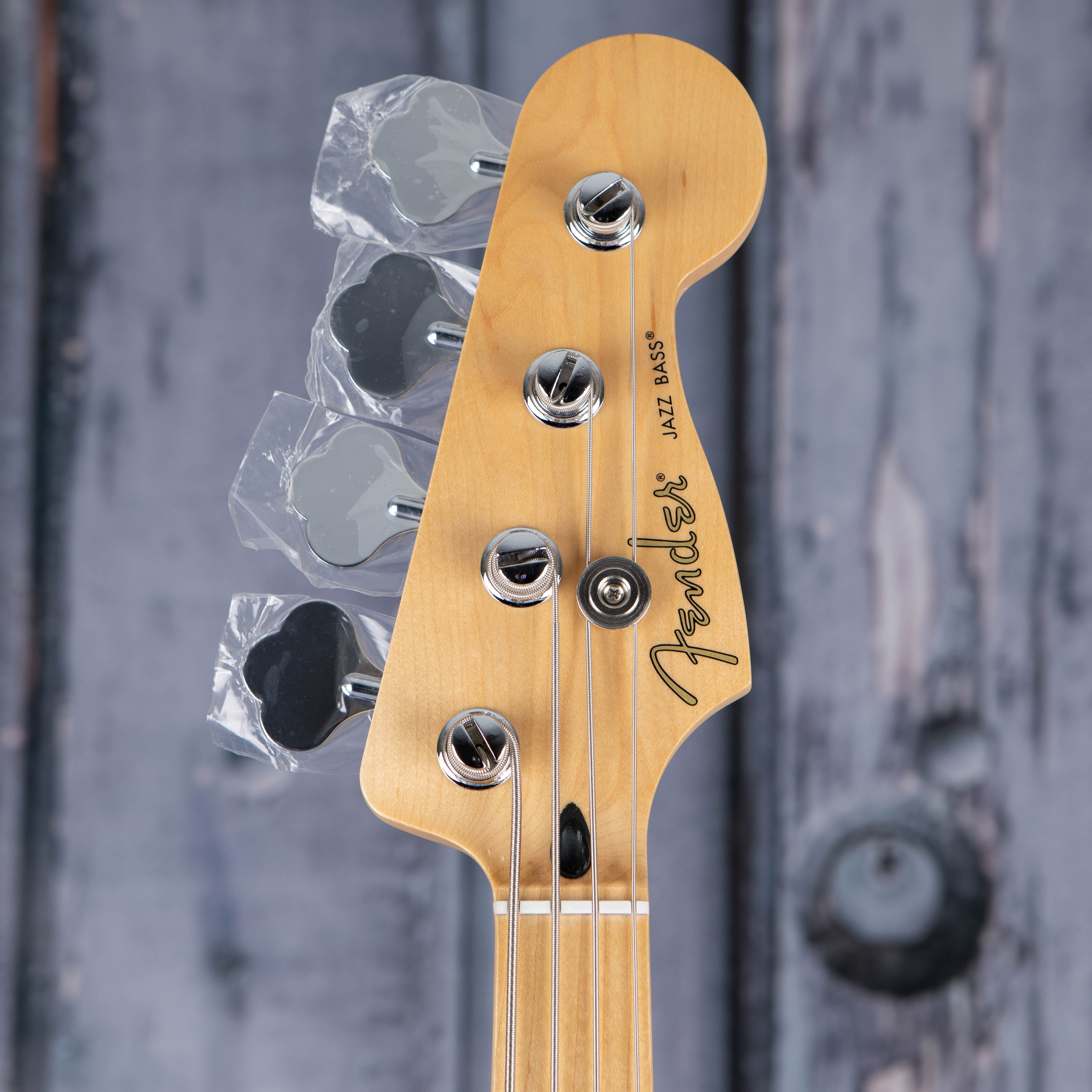 Fender Player Jazz Bass Guitar, 3-Color Sunburst, front headstock